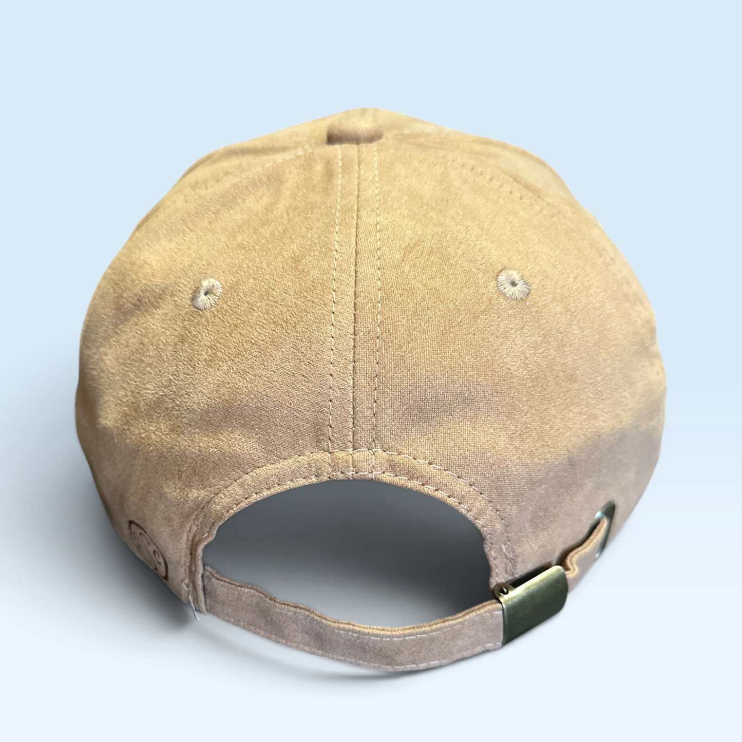 Back view of vegan sueded ball cap with adjustable strap buckle closure.