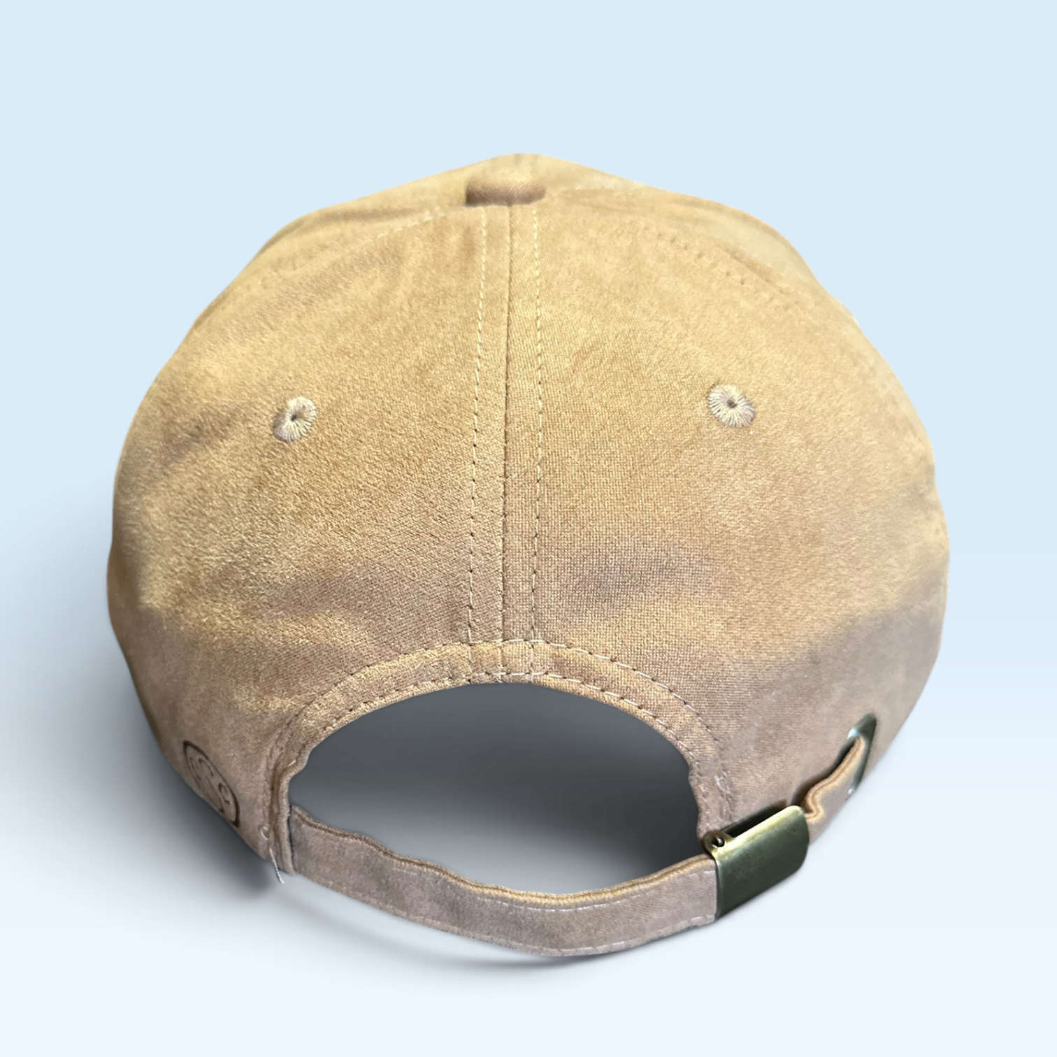 Back view of vegan sueded ball cap with adjustable strap buckle closure.